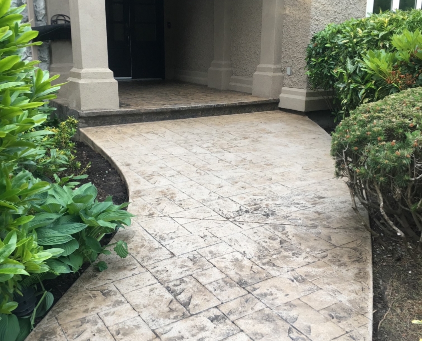 stamped concrete walkway before strata maintenance