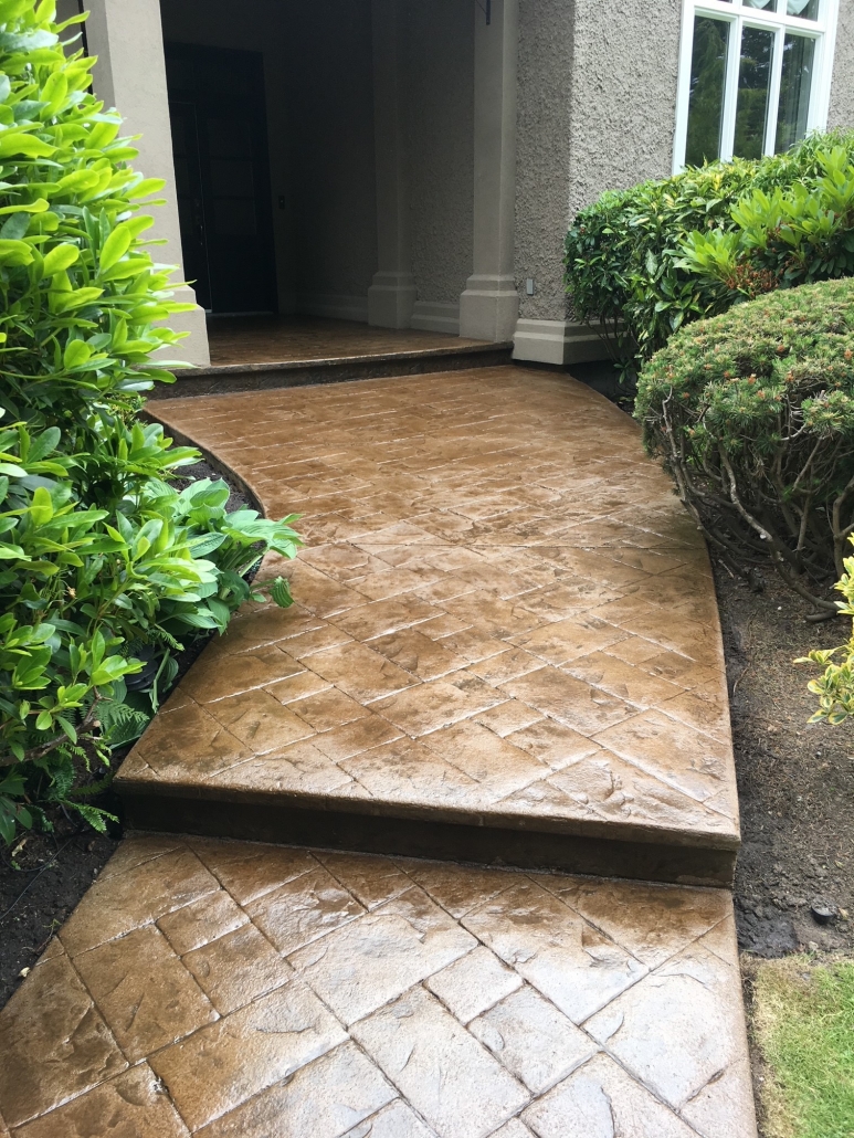 stamped concrete walkway after strata maintenance