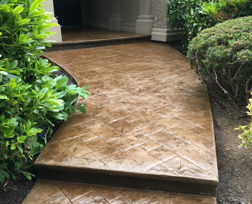 stamped concrete walkway after strata maintenance