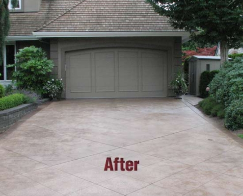 concrete driveway two car garage after sealing