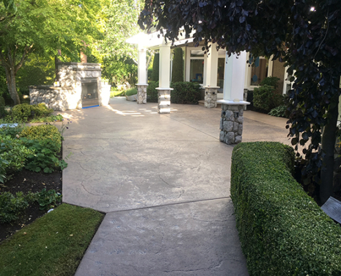 stamped concrete patio stone pillars before sealing