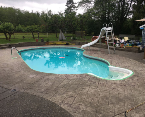 stamped concrete pool deck before sealing