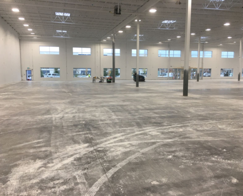 IMG_6152 warehouse concrete floor support pillars carts