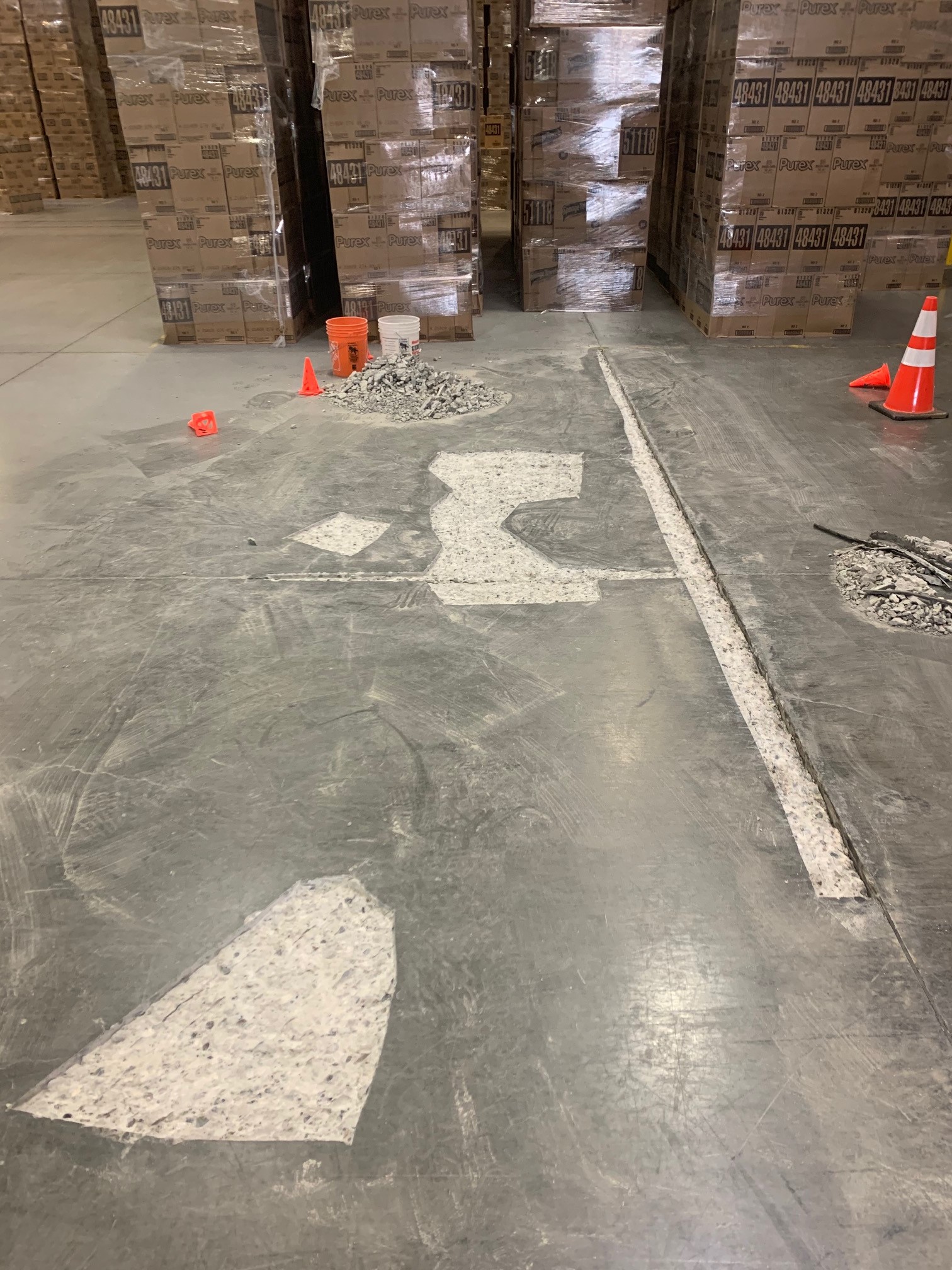 warehouse floor concrete removed before crack repair