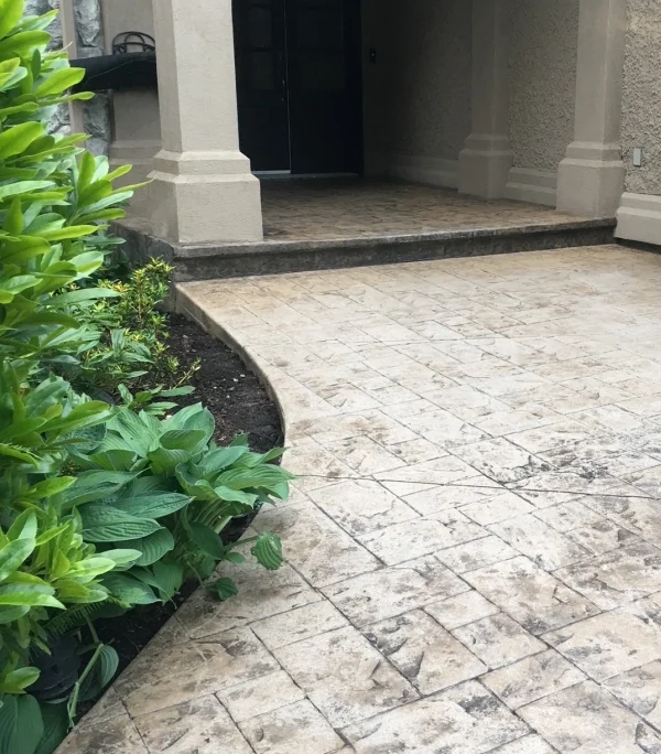 stamped concrete entrance walkway before restoration